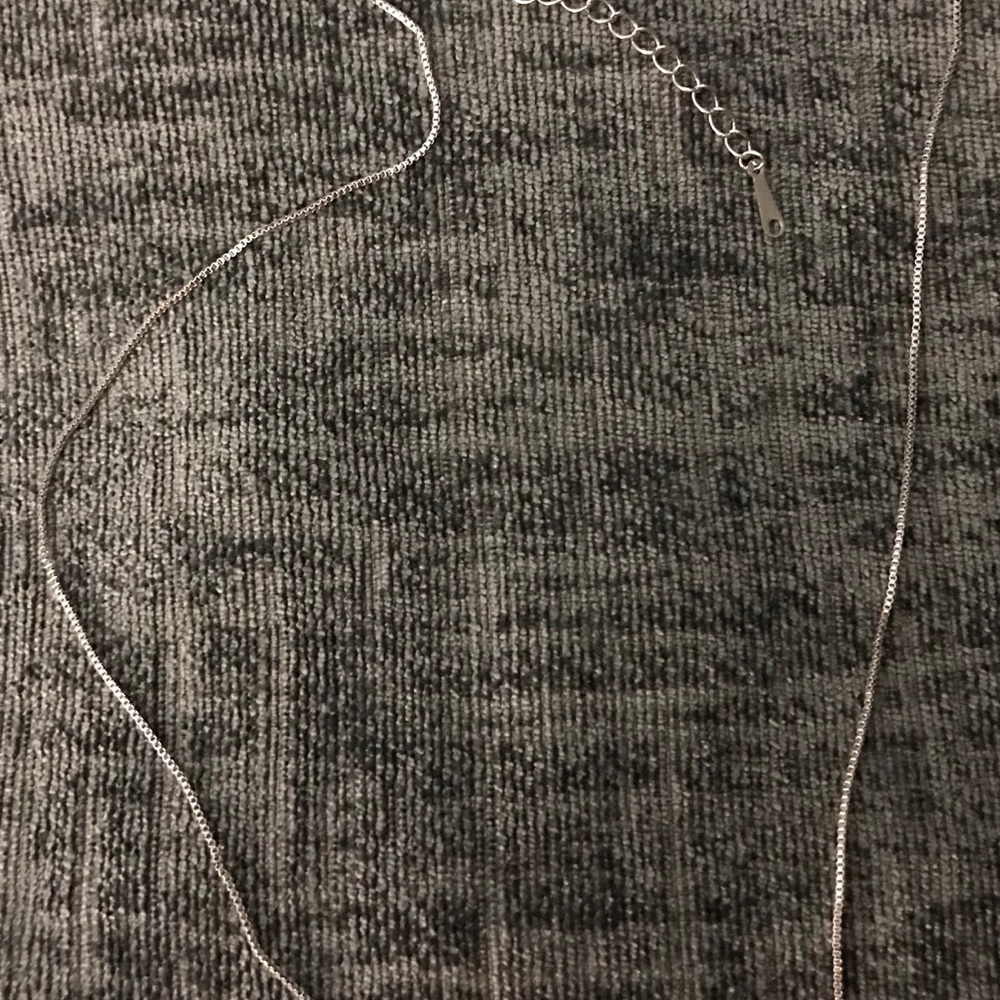 Two silver chains: each 18” with 2” Extender